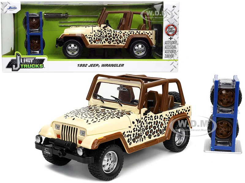 1992 Jeep Wrangler Tan and Brown with Graphics and Extra Wheels "Just Trucks" Series 1/24 Diecast Model Car by Jada - Jeep Models