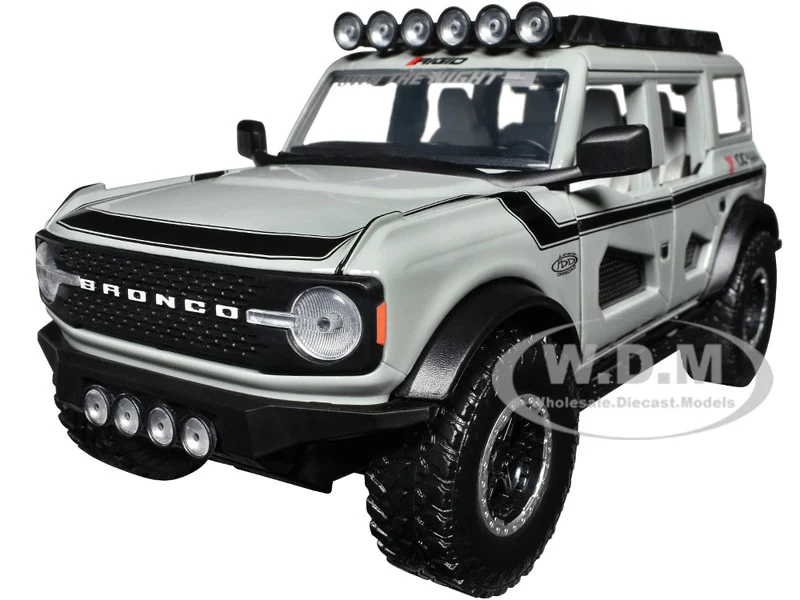 2021 Ford Bronco Gray with Black Stripes with Roof Rack "Own the Night" "Just Trucks" Series 1/24 Diecast Model Car by Jada - Ford Models