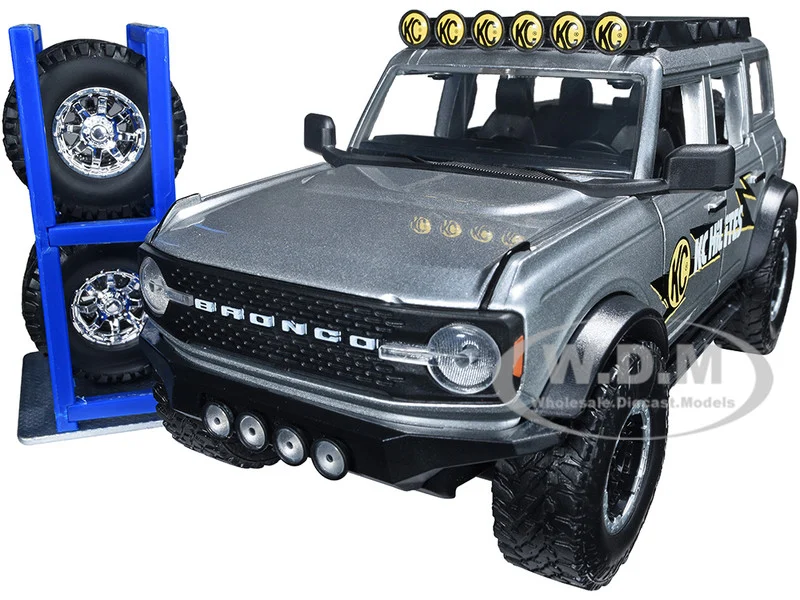 2021 Ford Bronco Gray Metallic "KC HiLiTES" with Extra Wheels "Just Trucks" Series 1/24 Diecast Model Car by Jada - Ford Models
