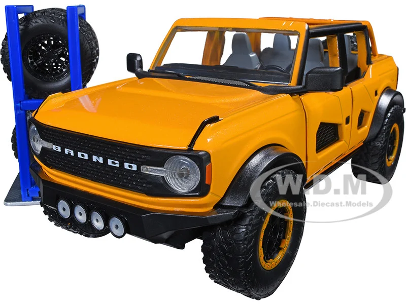 2021 Ford Bronco Orange Metallic with Extra Wheels "Just Trucks" Series 1/24 Diecast Model Car by Jada - Ford Models