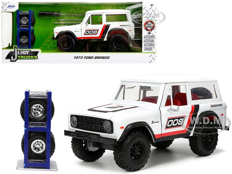 1973 Ford Bronco #008 White with Red and Black Stripes and Red Interior with Extra Wheels "Just Trucks" Series 1/24 Diecast Model Car by Jada - Ford Models