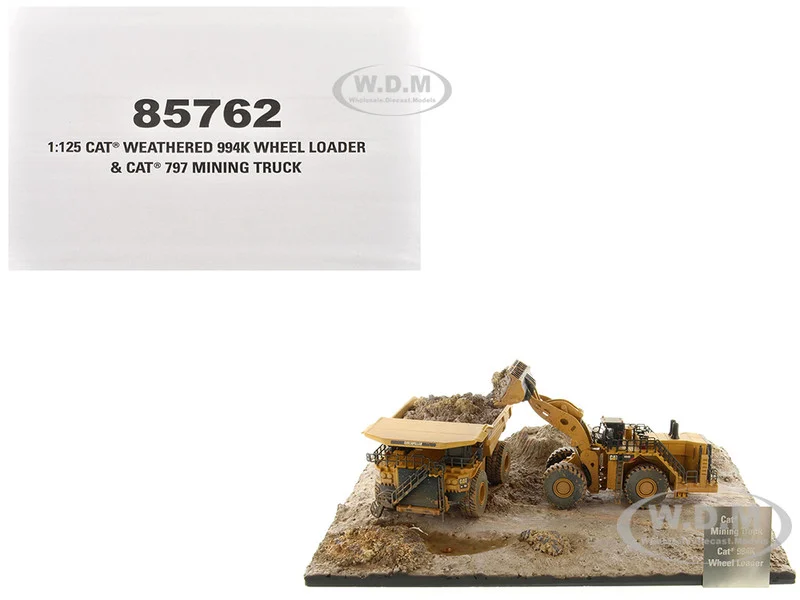 CAT Caterpillar 994K Wheel Loader and 797 Mining Truck Yellow (Weathered) Set of 2 Pieces "Weathered Series" 1/125 Diecast Model by Diecast Masters - Construction Models