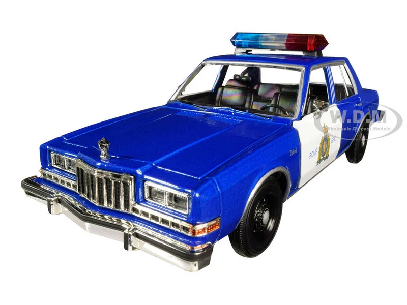 1986 Dodge Diplomat "Royal Canadian Mounted Police" Metallic Blue and White 1/24 Diecast Model Car by Motormax - Dodge Models