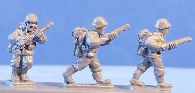 PIG080308 - US RIFLEMEN ADVANCING
