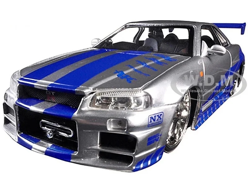 Brian's Nissan GTR Skyline R34 RHD (Right Hand Drive) Silver with Blue Stripes "Fast & Furious 25th Anniversary" Series 1/24 Diecast Model Car by Jada - Nissan Models