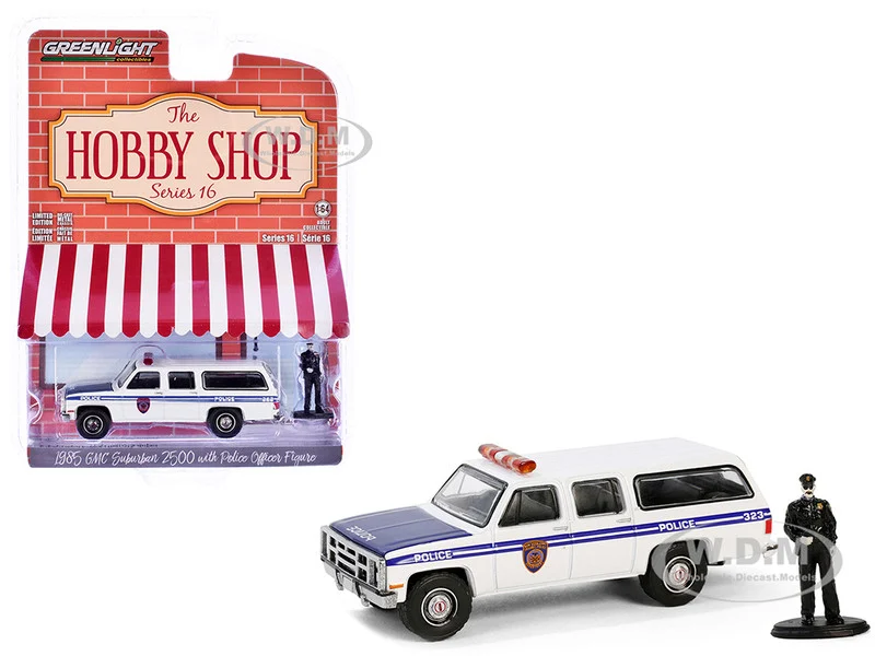 1985 GMC Suburban 2500 "New York City Transit Police Department" White with Blue Stripes and Police Officer Figure "The Hobby Shop" Series 16 1/64 Diecast Model Car by Greenlight - Police Models
