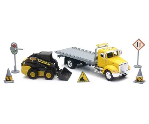Peterbilt Roll-Off Truck with New Holland Skid Steer and Accessories