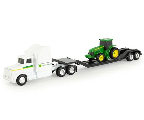 John Deere Farm Semi in White with Flatbed Trailer hauling a Four-wheel Drive Tractor