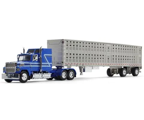 Ford LTL 9000 Semi Truck with 60 Aerodyne Sleeper in Blue and Silver with Wilson Stockmaster PSAL Livestock Trailer - DCP