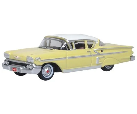 1958 Chevrolet Impala Sport Coupe in Light Yellow and White - OXFORD
