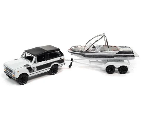 1979 International Scout II in White and Black with Malibu Boat and Trailer - JOHNNY LIGHTNING