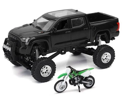 Toyota Tundra Pro Lifted Off-Road Pickup in Black with Kawaski Dirt Bike in Green and Black